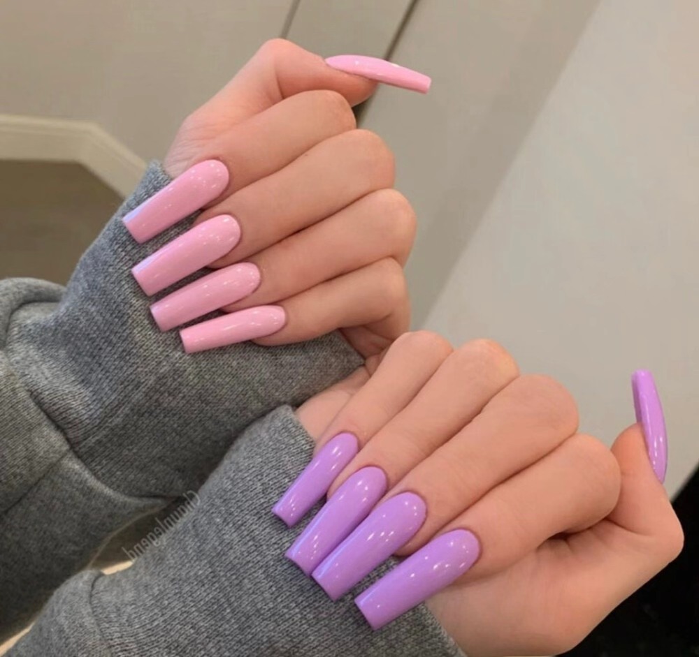 Glossy pink and lavender long coffin nails