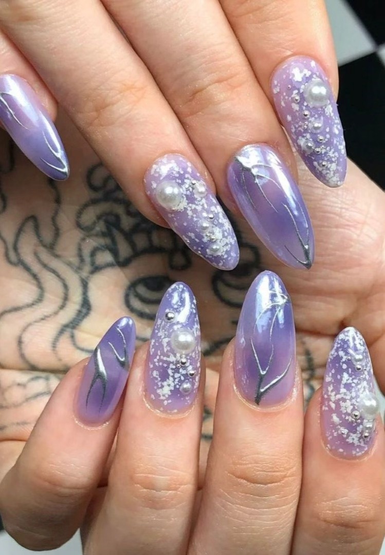 Lilac chrome nails with pearl accents
