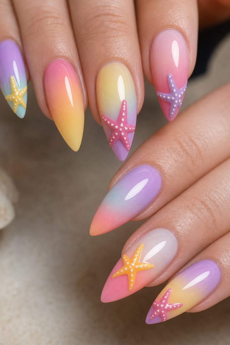 Pastel sunset gradient nails with starfish art